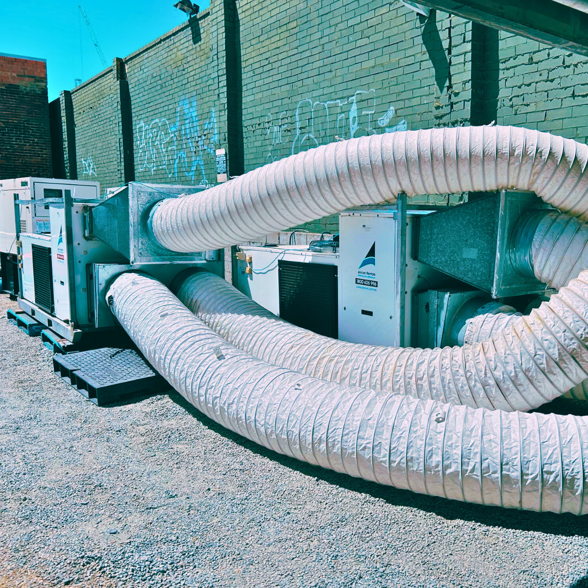 Industrial event air conditioner hire system with ducting, providing cooling for a festival venue in Perth.